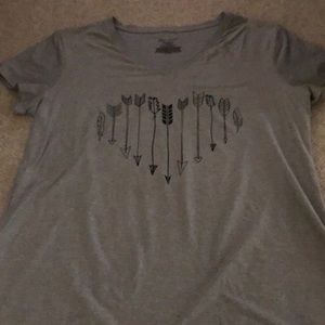 Gray dry fit shirt with a bone arrow heart